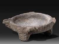 A mesopotamian grey stone altar bowl, syria, circa 1000 bce (+) 10 x 27 x 29 cm. (3.94 x 10.63 x 11.41 in.)