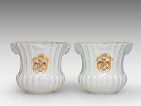 A pair of french earthenware vases decorated with a polychrome coat of arms, probably moustier, 18thc 16.5 cm. (6 1/2 in.)