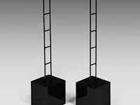 A pair of granite and metal pedestals 134 cm. (52.75 in.)