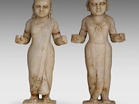A pair of indian carved marble figures of hindu/jain deities, 19thc, h 39 cm