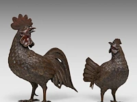 A pair of japanese bronze okimono of a hen and cockerel, meiji period (1868-1912), h 32 cm / h 23 cm
