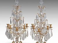A pair of rococo brass and cut crystal girandoles, 19thc 88 cm. (34.64 in.)