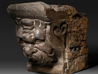 A renaissance carved oak corbel with the head of a bearded man 28 x 41 cm. (11.01 x 16.14 in.)