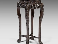 A richly carved chinese hardwood stand with a marble top, late 19thc 91 x 50 cm. (35.82 x 19.67 in.)