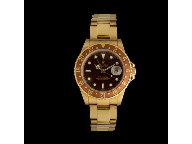 A rolex gmt-master, ref. 16758, 18ct yellow gold with brown dial and bezel - afbeelding 1 van  14