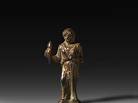A roman fascinum bronze figure of astarte holding a phallus, syria, 1st century b.c. 7.5 cm. (2.95 in.)