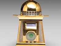 A royal selangor 'al-bilali' 24ct goldplate pewter table clock shaped as a mosque 20 cm. (7.87 in.)