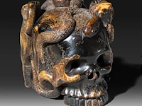 A sculpted japanese okimono of a skull with frogs, a snake and a snail, meiji period (1868-1912), signed, h 6,5 cm - w 7 cm