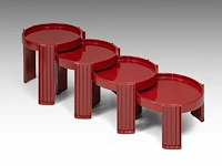 A set of 4 italian space age red plastic marema occasional tables, designed by gianfranco frattini for cassina 38 x 44 cm. (14.96 x 17.32 in.)
