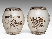 A similar pair of chinese cizhou ware garden chairs, flanked by lion masks, ming dynasty, h 39 cm