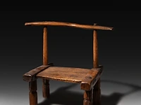 A small wooden gba circumcision chair, baoulé people, ivory coast 40.5 x 27.5 x 25 cm. (15.93 x 10.83 x 9.83 in.)