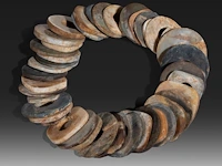 A string of chinese archaic jade plaques and bi-discs, late neolithic period, largest ø 6,5 cm