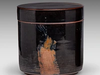 A tenmoku/jian ware style glazed stoneware lidded jar, marked 'denmark', h 22 - ø 22 cm