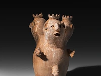 A terracotta three-headed nana densu legba torso figure, fon people, benin, 35 cm. (13.77 in.)