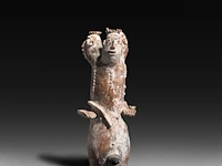 A terracotta three-headed nana densu legba torso figure, fon people, benin 37 cm. (14.57 in.)
