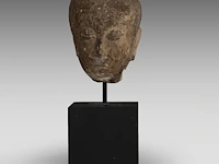 A thai stone head of buddha, ayutthaya style, 16thc-18thc, total h 47,5 cm