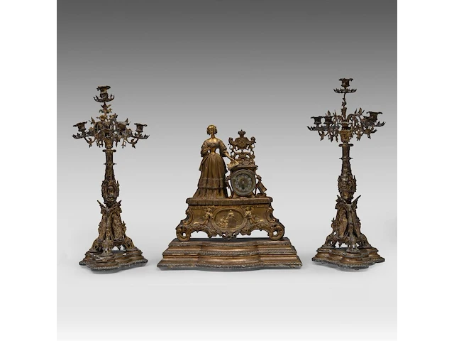 A three-piece eclectic gilt metal mantel clock set, with on top louise marie of orléans, queen of the belgians, mid 19thc the clock 45 x 43 cm. (17.71 x 16.92 in.), the candelabra: 66 cm. (25.98 in.) - afbeelding 1 van  8