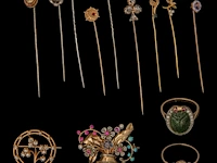 A various collection of a silver and a gold brooch, 9 tie clips and two gold rings
