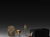 A various collection of brass phallus-themed items, ca. 1900, h 9 cm (the plaque)