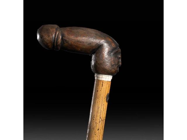 A various collection of carved wooden folk walking sticks with phallic handles - afbeelding 7 van  13