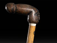 A various collection of carved wooden folk walking sticks with phallic handles - afbeelding 7 van  13