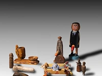 A various collection of phallic-themed folk dolls, h 25 cm (tallest)