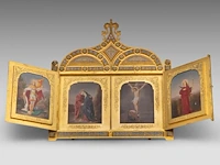 A very fine gothic revival gilt bronze and enamel triptych, with hand-painted porcelain plaques, late 19thc 31 cm. (12.19 in.)