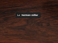 A vintage lounge chair with an ottoman by charles & ray eames for herman miller, '70s edition - afbeelding 2 van  17