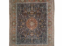 A woollen oriental persian rug decorated with various animals 380 x 301 cm. (149.61 x 118 1/2 in.)