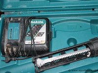 Accu kitpistool makita dcg 180, vv oplader, werking niet gekend - afbeelding 2 van  3