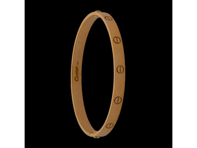 An 18ct yellow gold cartier love bracelet, 6,6 x 5,5, weight: 35,4 g - afbeelding 1 van  7