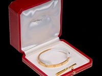 An 18ct yellow gold cartier love bracelet, 6,6 x 5,5, weight: 35,4 g - afbeelding 5 van  7