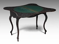 An anglo-indian carved hardwood fold-over card table, 19thc, h 78 cm - w 108 cm
