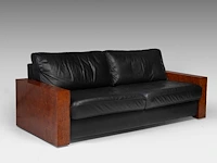 An art deco style burr wood and black leather settee 80 x 205 x 90 cm. (31 1/2 x 80.70 x 35.42 in.)