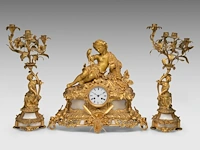 An assembled gilt bronze and marble three-piece mantle clock set, with an allegory of fishing on top, late 19thc the clock: 45 x 49 cm. (17.71 x 19.28 in.), frame: 54 cm. (21.26 in.)