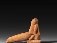 An egyptian phallic limestone figure, new kingdom 7.5 x 11 cm. (2.95 x 4.33 in.)