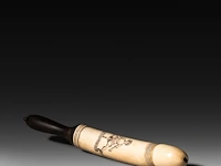 An engraved ivory dildo 'the whirligig' with a wooden handle, english, 19thc, total h 35,5 cm - ivory h 21 cm - ø 4,5 cm - 452g (+)