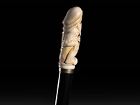 An erotic walking stick with an ivory handle depicting a phallic demon, english, 19thc, total h 92 cm - ivory h 9 cm - ivory w 2,8 cm - total weight 238g (+) - afbeelding 2 van  5