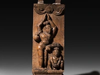 An exceptional carved wooden panel of a sadhu with an erection, tamil nadu, india, 19thc 51 x 20 cm. (20.07 x 7.87 in.)
