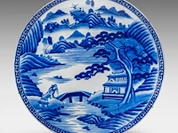 An imposing japanese arita 'mountainous landscape' large plate, meiji, ø 60 cm