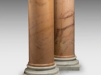 An imposing pair of yellow sienna and carrara marble columns 119 cm. (46.85 in.)