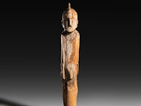An impressive carved wooden waga memorial statue, konso people, ethiopia 130 cm. (51.17 in.)