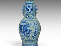 An impressive chinese blue and white on celadon ground 'battle scenes' vase, paired with recumbent lion handles, 19thc, h 86 cm