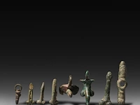 An interesting collection of 8 roman bronze fascinum phallic pendants, h 6 cm (tallest)