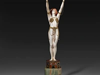 An ivory art deco sculpture of an oriental dancer on an onyx base, interwar period, total h 35 cm - ivory h 26 cm - total weight 1131g (+)