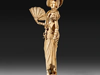 An ivory sculpture of a fine lady with a fan, dieppe, 19thc, h 28 cm - 541g (+)