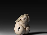 An ivory shibayama inlaid sculpture of male genitalia represented as a vegetable, signed with faux japanese characters, 19thc, h 4,5 cm - w 8 cm - d 5,7 cm - 171g (+)