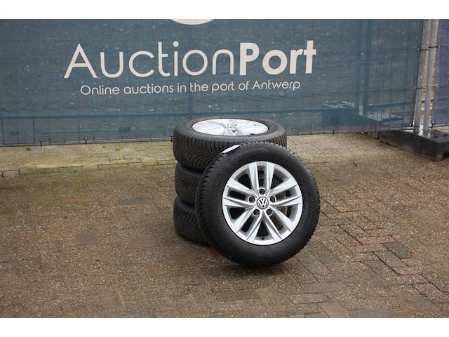 Banden dunlop 195/65r15 met velg volkswagen 4 stuks (marge) - afbeelding 1 van  1