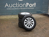 Banden dunlop 195/65r15 met velg volkswagen 4 stuks (marge) - afbeelding 1 van  1