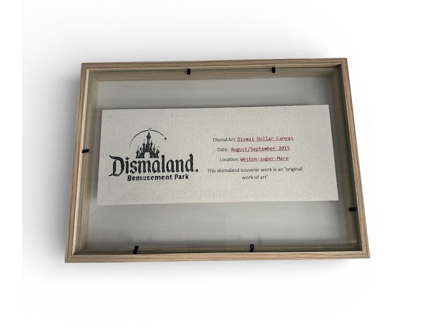Banksy dismaland dollar 'napalm' - afbeelding 6 van  11